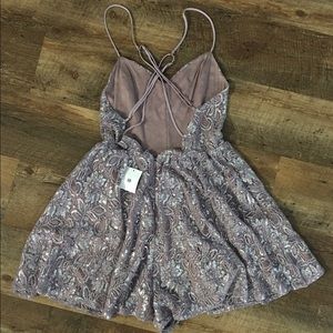 UO Shimmer & Lace Flare Romper